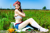 Tiny tit teen in field Tiny tit teen in field