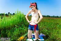 Tiny tit teen in field Tiny tit teen in field