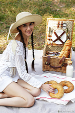 Brunette posing outdoors