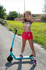 Nude teen on a scooter Nude teen on a scooter