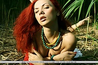 Lusty and erotic redhead in daring and arousing poses. Lusty and erotic redhead in daring and arousing poses.