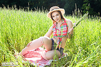 Brunette in the grass